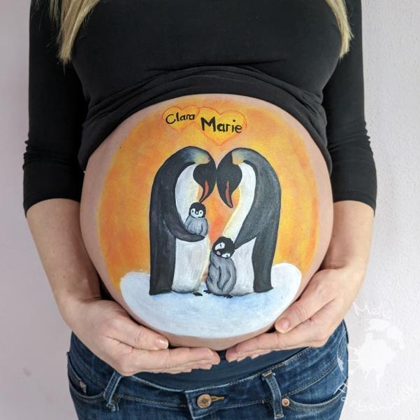 Babybauch mit Pinguinen